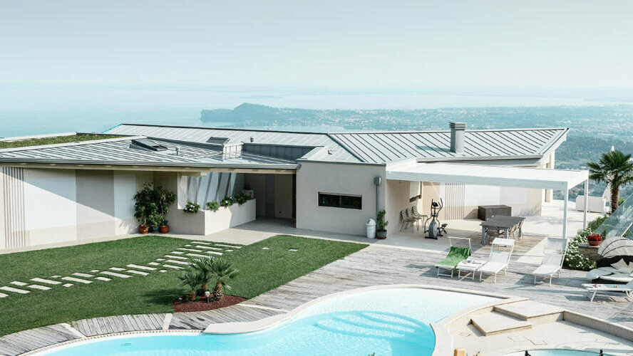 Casa privata in posizione unica con piscina. Il tetto piano dell'edificio moderno è rivestito in Prefalz patina grigio.