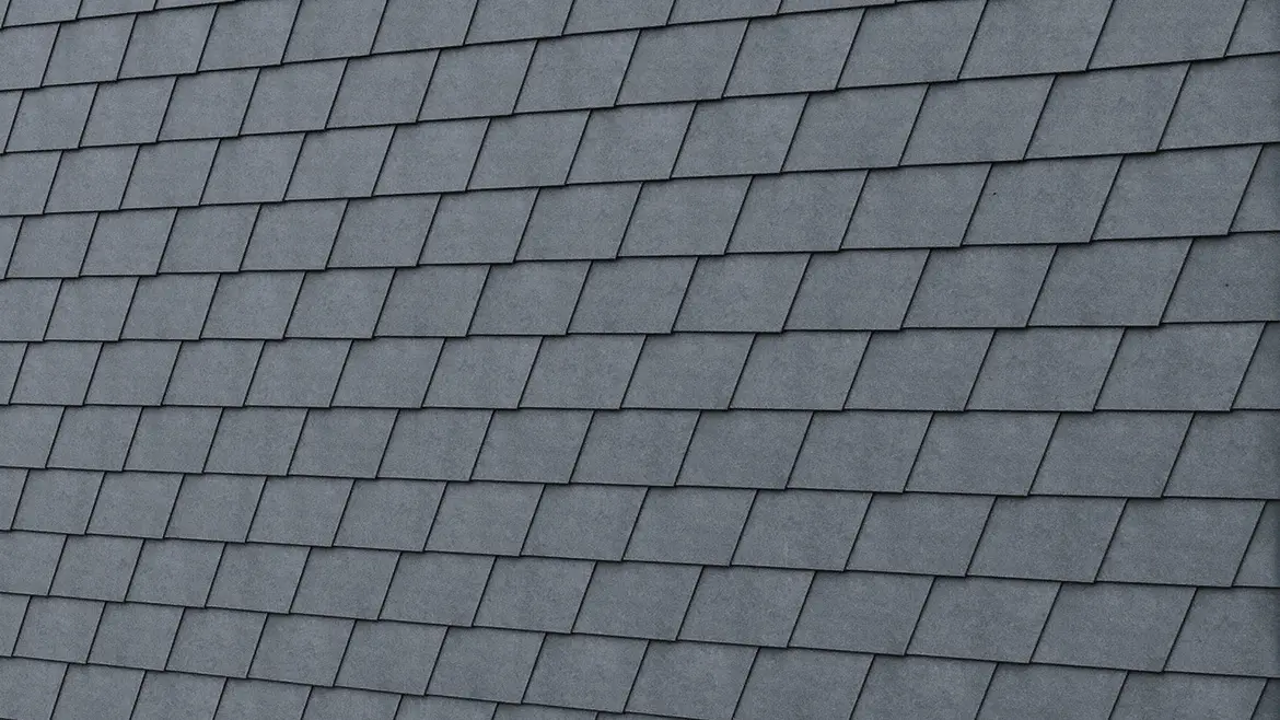 Particolare della scandola per facciata PREFA in P.10 grigio pietra