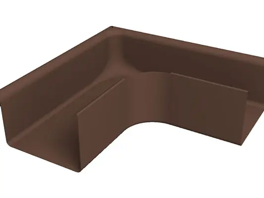 L'immagine mostra un angolo 90° per canali di gronda PREFA marrone per esterni in alluminio di alta qualità. Questo robusto accessorio per grondaie serve a collegare in modo sicuro i canali di gronda agli angoli esterni e garantisce uno smaltimento affidabile delle acque piovane. L'angolo per canali di gronda è disponibile nelle misure 250, 333, 400 e 500.