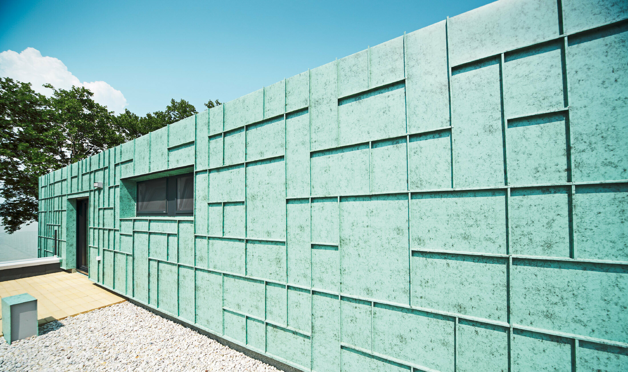 Casa unifamiliare moderna con facciata a prova di tempesta rivestita con PREFALZ di colore P.10 patina verde.