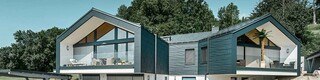 [Translate to deutsch:] PREFA Einfamilienhaus mit Dachpaneel FX.12 und Quadratrohr in Anthrazit